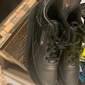 Black paid Reebok work twice still look new size 10w  in womens